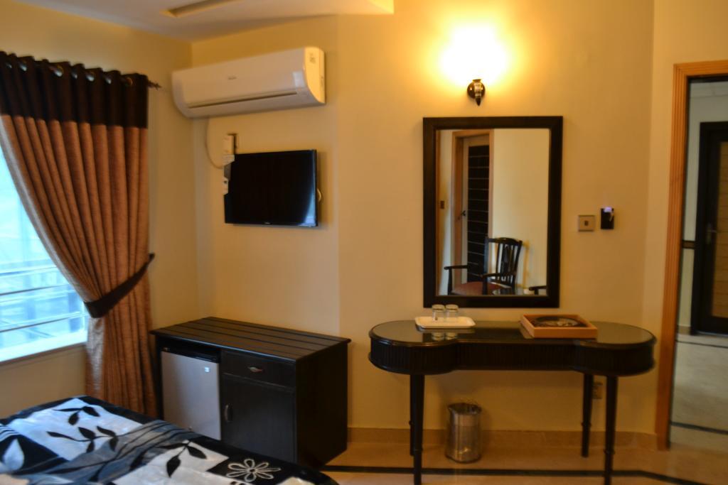 Hotel de Palazzo Islamabad Camera foto