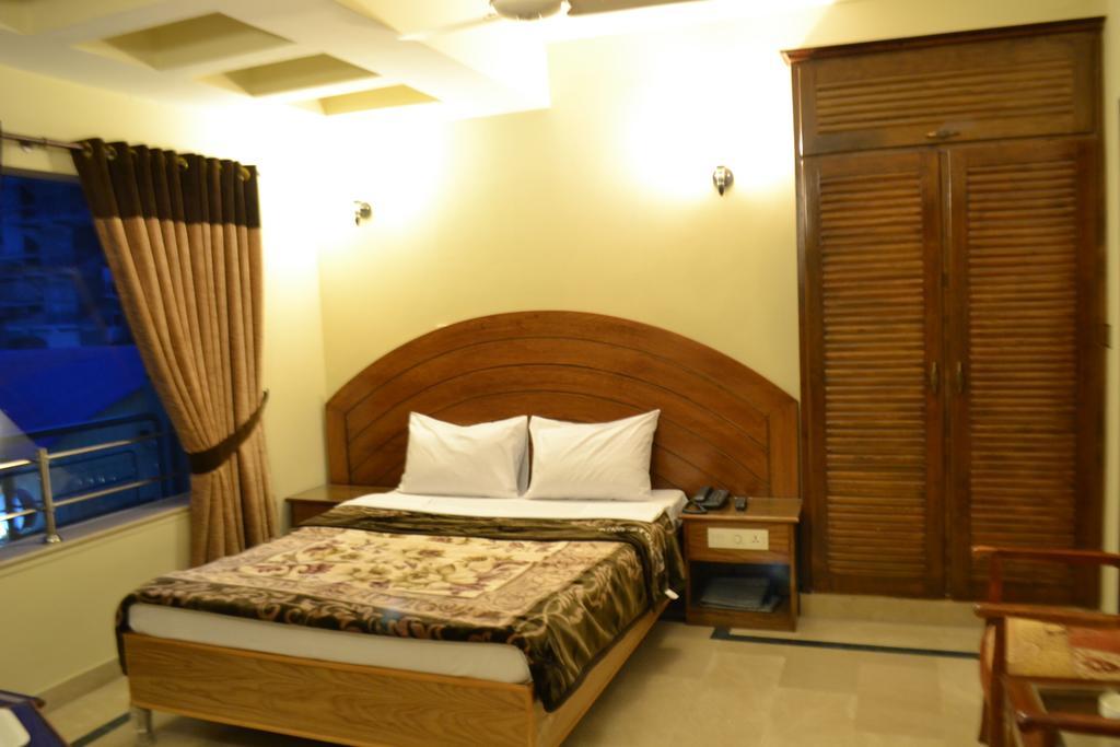 Hotel de Palazzo Islamabad Camera foto